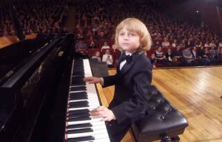 Amazing little pianist Elisey Mysin (8 years old) performing piano concert in D major by Mozart